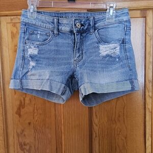 American Eagle Midi Light Blue Distressed Jean Shorts